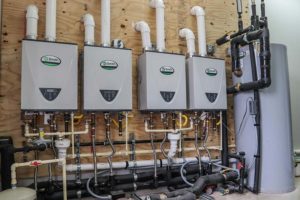 Tankless and conventional commercial water heaters that need service from Houston commercial plumber