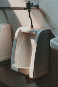 Urinal that needs repair from Houston commercial plumber