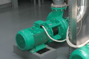 Booster pump that needs service from a Houston commercial plumber.